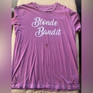 Distressed Mauve/distressed purple graphic tee from a boutique